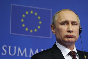 Russian President Putin speaks at a news conference after an EU-Russia Summit in Brussels